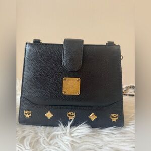 MCM Black Crossbody Bag with Gold Hardware and Pebbled Leather